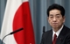 Foto : LEADERSHIP: Japan's Finance Minister Naoto Kan reacts after winning the Democratic Party of Japan party election in Tokyo